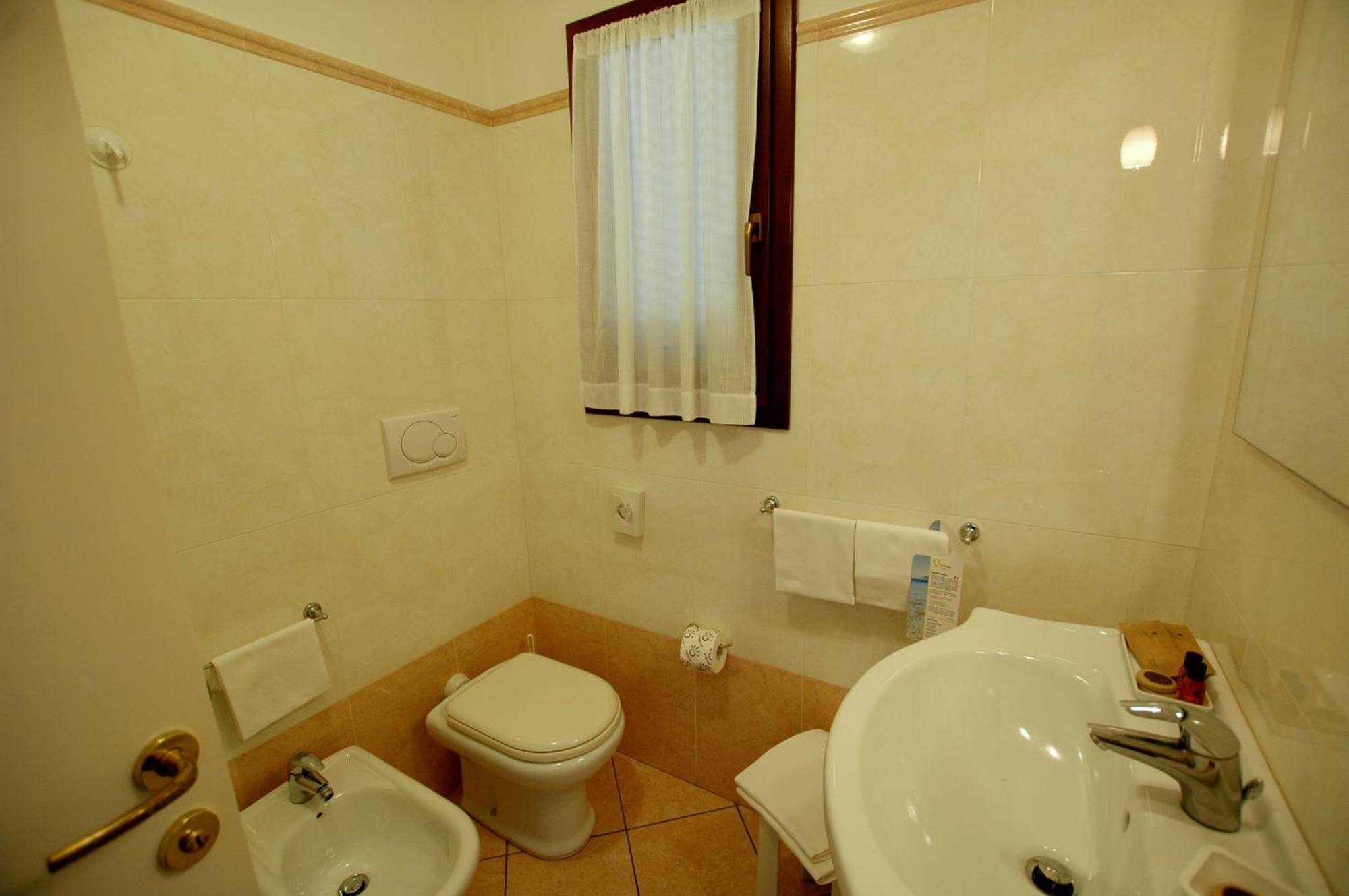 Hotel Mistral Marina di Campo Pokoj fotografie